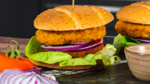 Burger de volaille halal - Réghalal, avec oignons et tomates